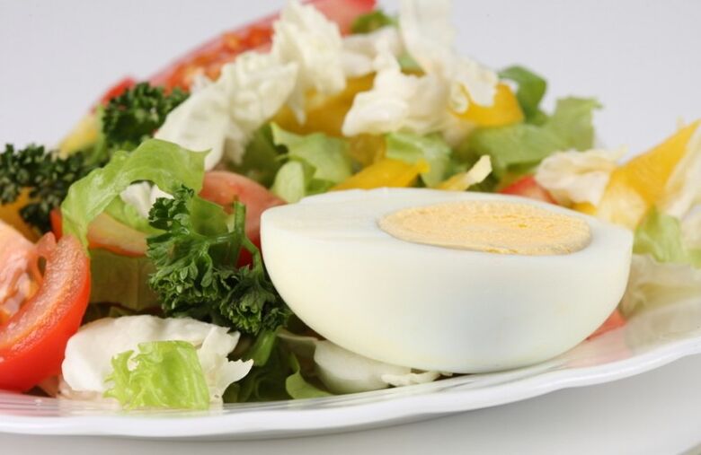 Fresh vegetable salad with boiled eggs on Maggi’s diet menu